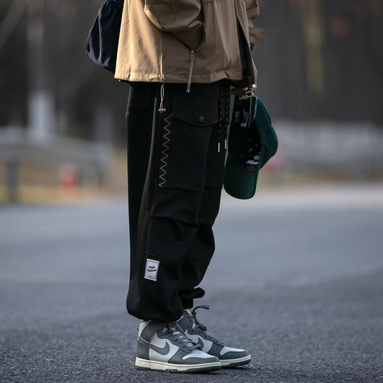 Herren weite Cargo-Jogginghose mit Kordelzug Klapptaschen und elastischen Bündchen Shop Nory
