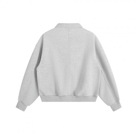 Unisex Boxy-Polo-Sweatshirt mit Henley-Knopfleiste, Raglanärmeln und Eingrifftaschen Shop Nory