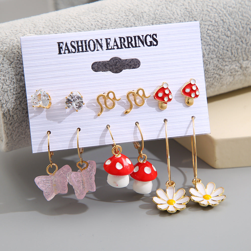 Damen Ohrringe Set mit verspielten Designs und funkelnden Elementen Shop Nory