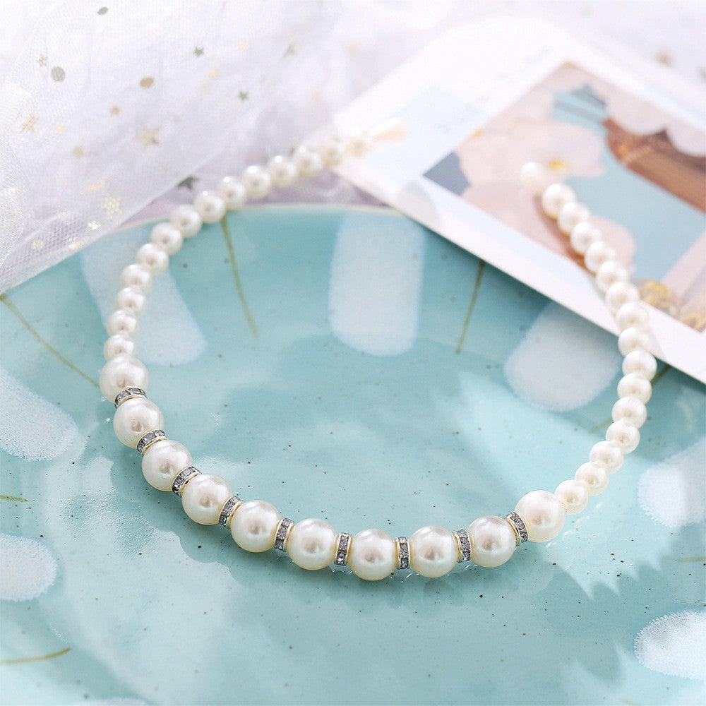 Damen Haarband mit eleganten Perlenakzenten Shop Nory