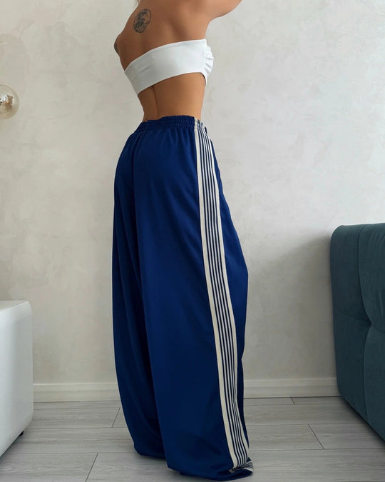 Damen weite Sporthose mit diagonalen Streifen