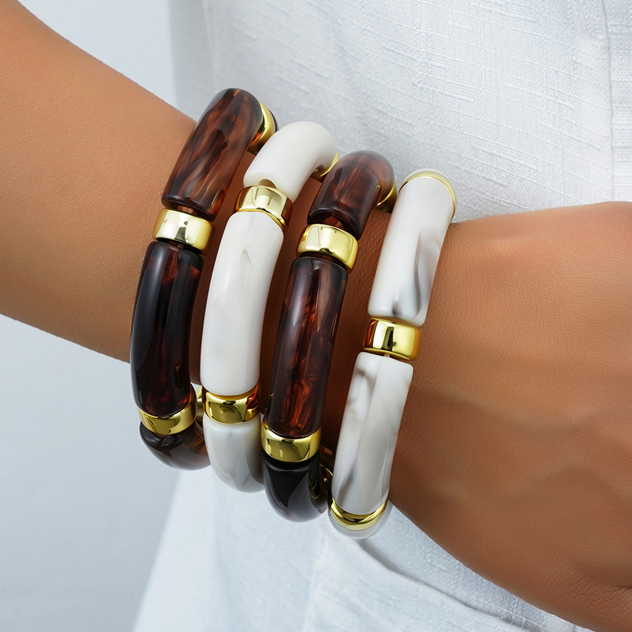Damenarmreif mit geschwungenem Design und glänzender Oberfläche Shop Nory