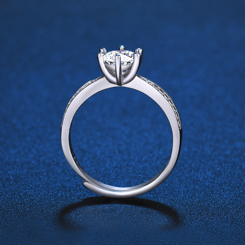Damenring mit funkelndem Hauptstein und eleganter Zirkonia-Verzierung Shop Nory