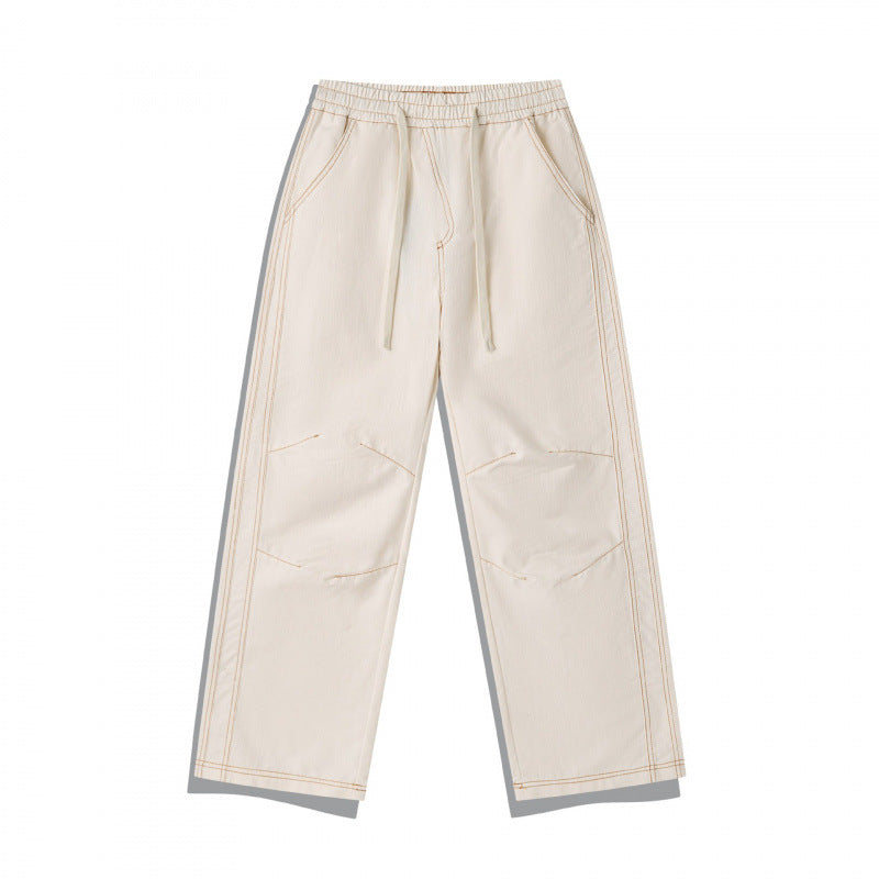 Unisex Weite Denim-Hose mit elastischem Bund, Kordelzug und gesteppter Kniepasse Shop Nory
