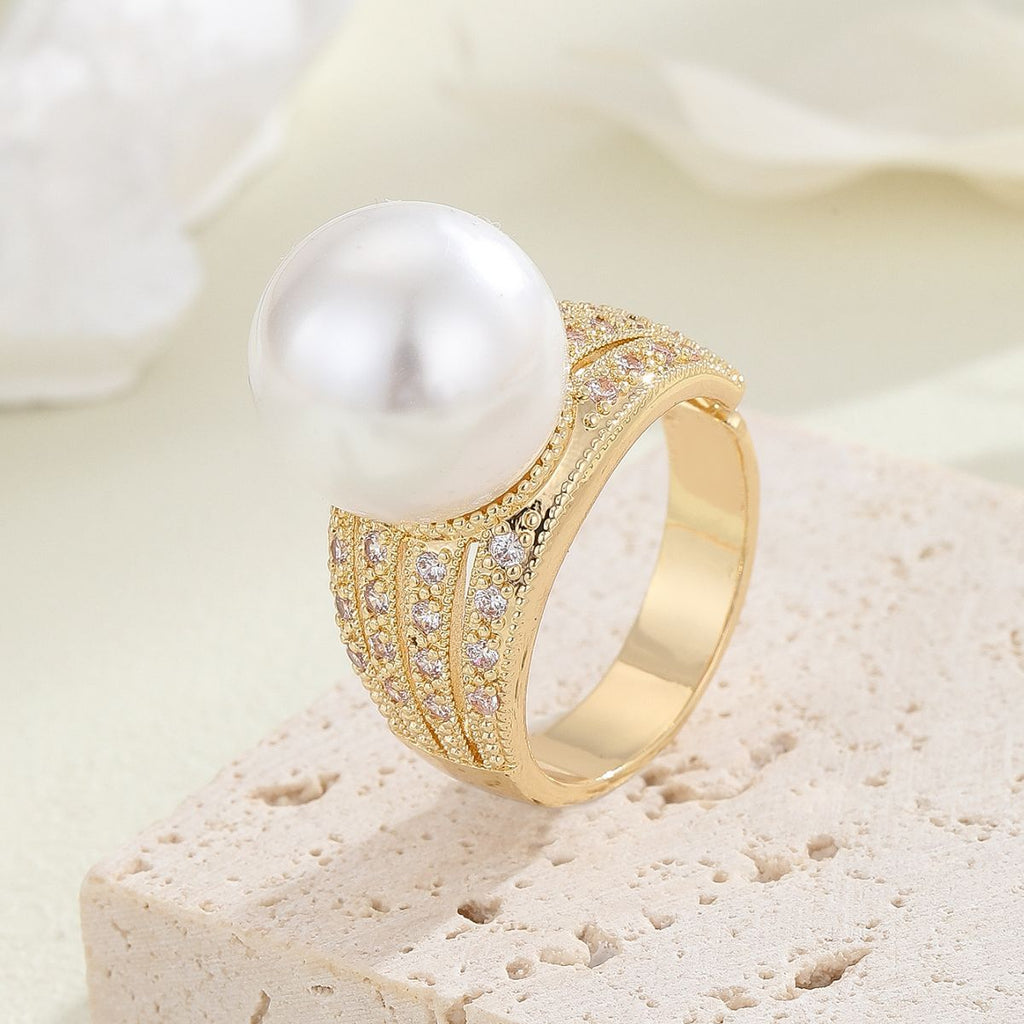 Damenring mit hochwertiger Perle und funkelnden Kristallen Shop Nory