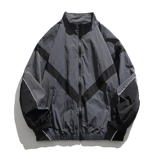 [Unisex] Oversize technische Wind- und Regenjacke mit Stehkragen, reflektierenden Paspeln und elastischem Saum Shop Nory
