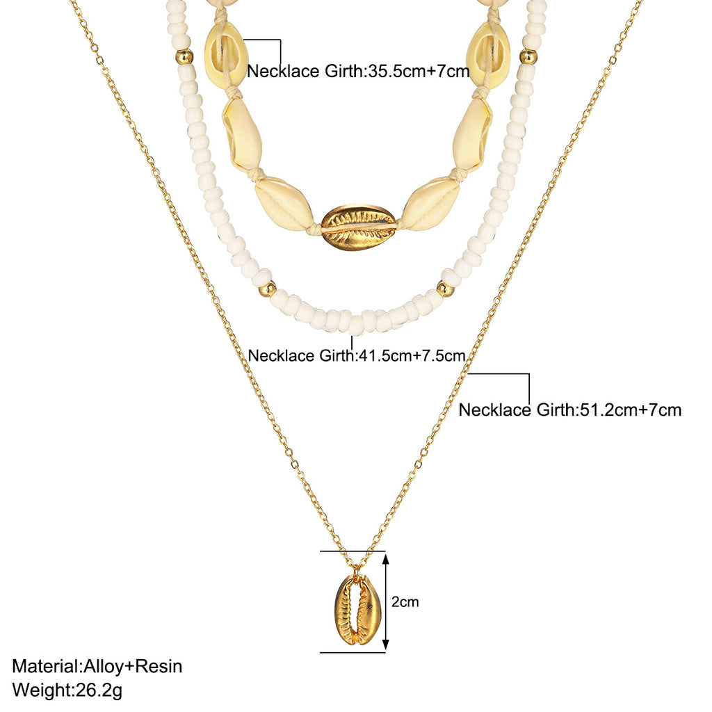Damen mehrlagige Muschelkette mit goldenen Akzenten Shop Nory