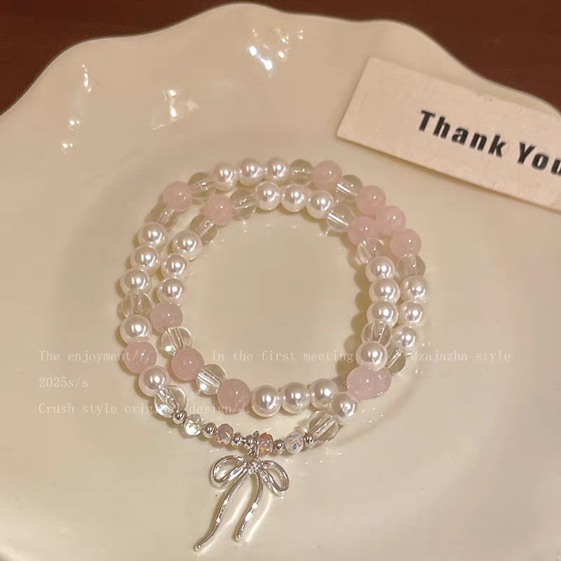 Damen Armbandset mit Perlen und charmantem Schleifenanhänger Shop Nory