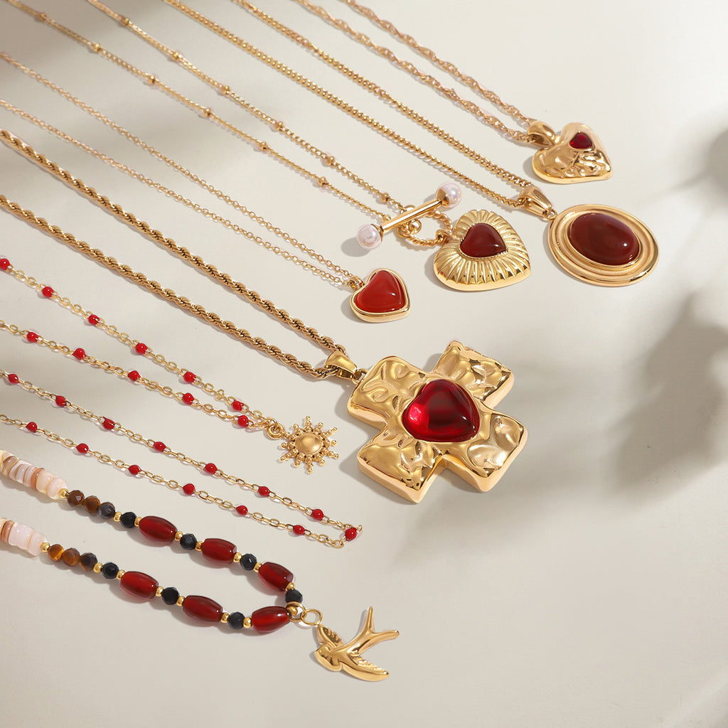 Damen Halskette mit herzförmigem Anhänger aus hypoallergenem Edelstahl und klassischem Kreuzdesign Shop Nory