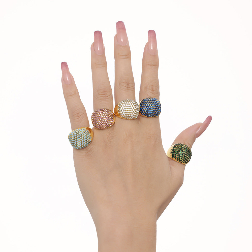 Damenring mit elegantem, goldbeschichtetem Design und Türkissteinbesatz Shop Nory