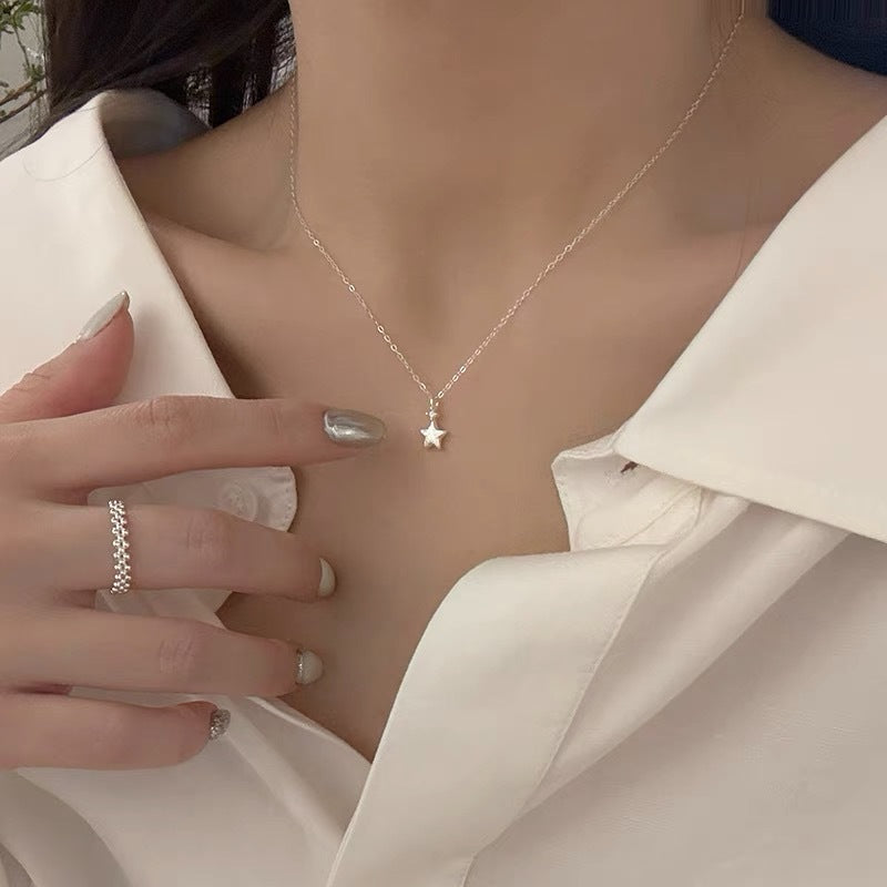 Damen Halskette mit funkelndem Sternanhänger und feiner Gliederkette Shop Nory