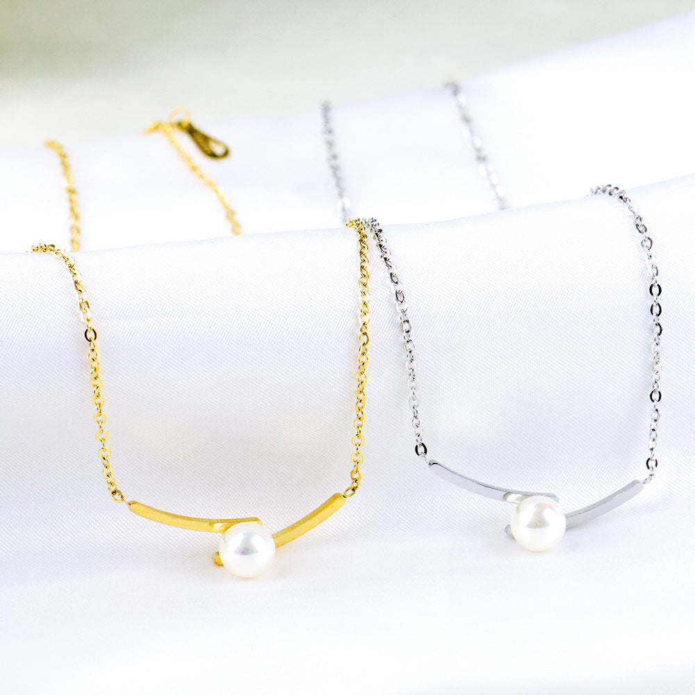 Damen Halskette mit elegantem Perlenanhänger und modernem Edelstahl-Design Shop Nory