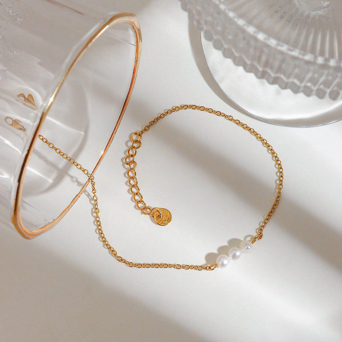 Damen zierliches Armband mit Perlenakzenten aus Edelstahl Shop Nory