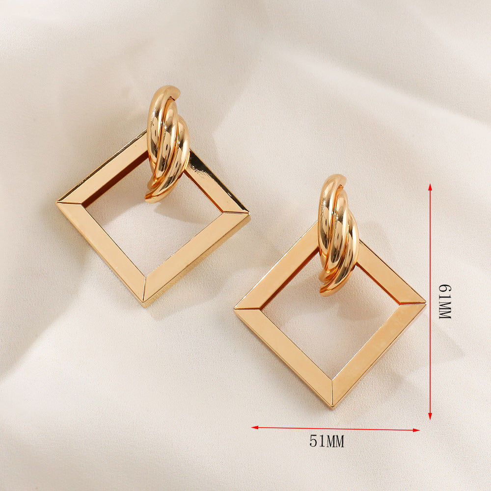 Damen Ohrringe im zeitgenössischen Quadratringdesign Shop Nory