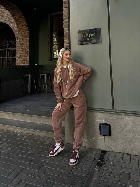 Damen kuscheliges Sweat-Set mit extralangem Kapuzenpullover, verdeckter Kängurutasche und schmal zulaufender Bündchenhose Shop Nory