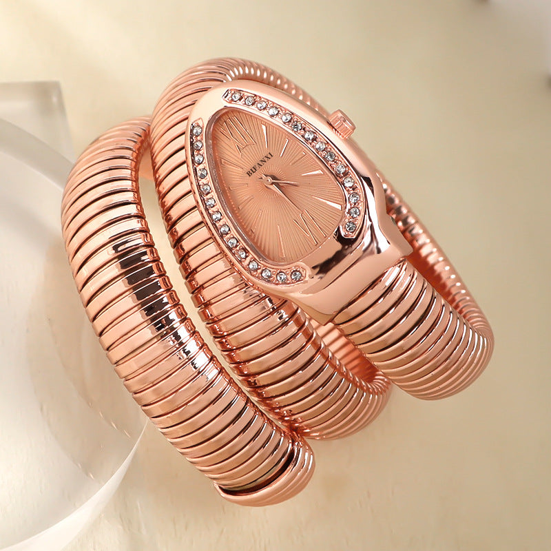 ShopNory | Schlangenuhr mit Quarzbewegung und Persönlichem Armband