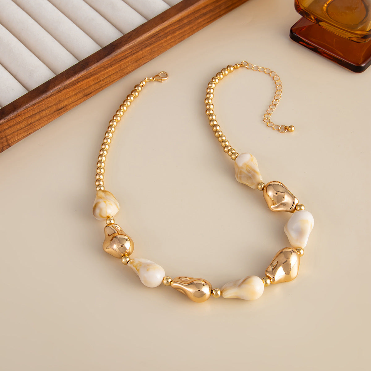 Damen elegante und modische Kette mit goldenen und türkisfarbenen Elementen Shop Nory