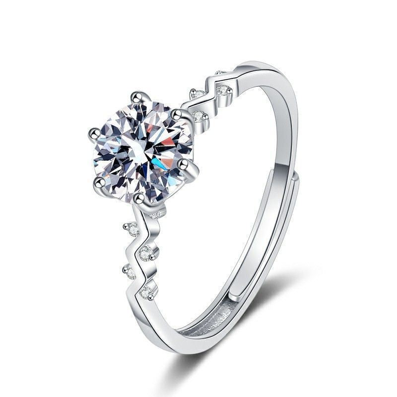 Damen eleganter Ring mit funkelndem Solitär und verspieltem Zirkonia-Besatz Shop Nory