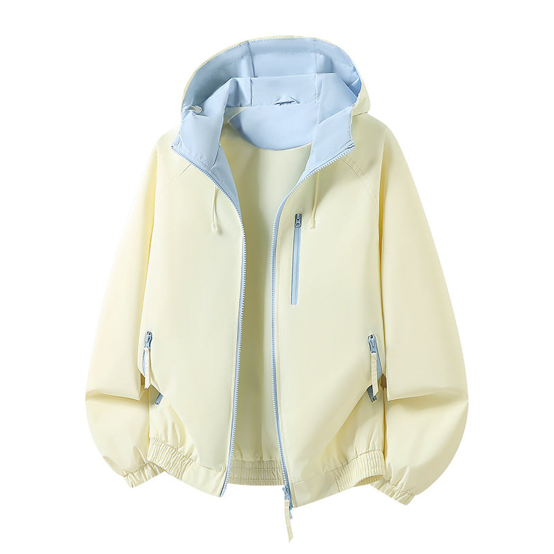 Damen Leichte Kapuzen‑Shelljacke im Urban‑Look mit kontrastfarbenem Futter, Reißverschlusstaschen und elastischem Bund Shop Nory