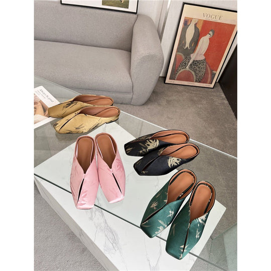 Damen fersenfreie spitz zulaufende Jacquard-Mules mit floralem Metallic‑Muster und flachem Absatz Shop Nory