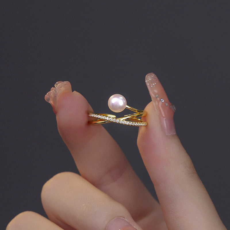 Damen Zierlicher Ring mit geschwungenem Design und Perle Shop Nory