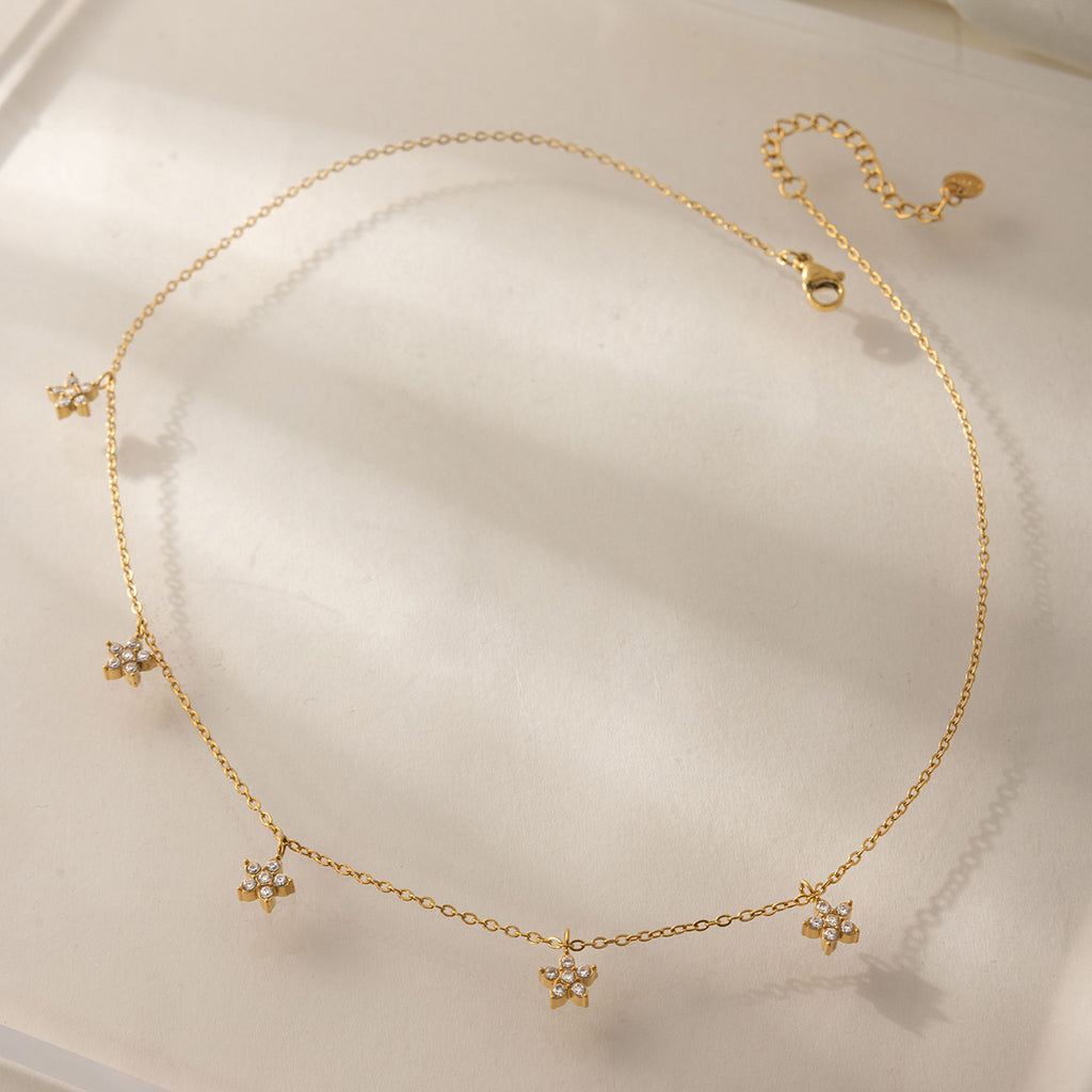 Damen Halskette mit mehrlagigem Design und funkelndem Sternanhänger Shop Nory