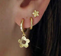 Damenohrringe mit floralen Anhängern und funkelnden Details Shop Nory