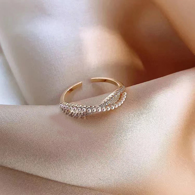 Damen eleganter Perlenarmreif mit funkelnden Zirkonias Shop Nory
