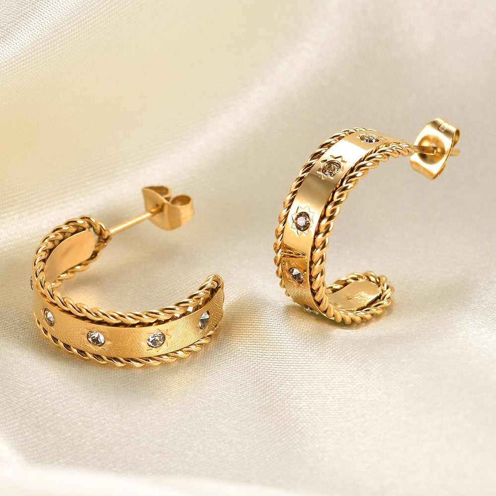 Damen Creolen mit funkelnden Kristallen und elegantem Spiraldesign Shop Nory