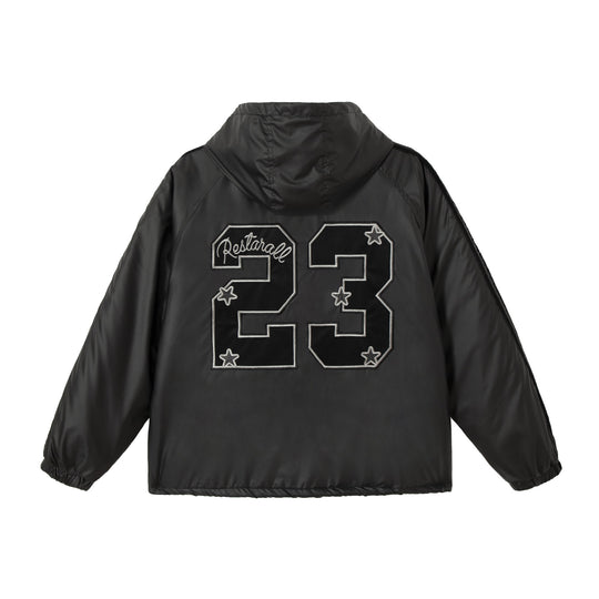 Unisex Boxy‑wattierte Kapuzenjacke mit gesticktem Wappen Shop Nory