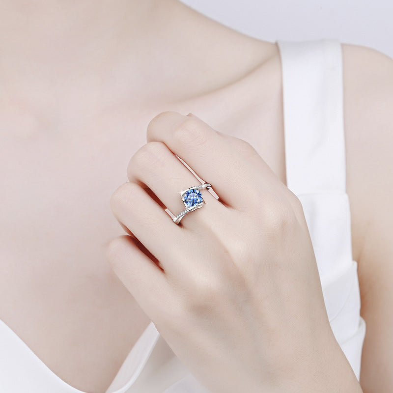 Damenring mit elegantem, facettiertem Hauptstein und funkelnden Zirkonia Shop Nory