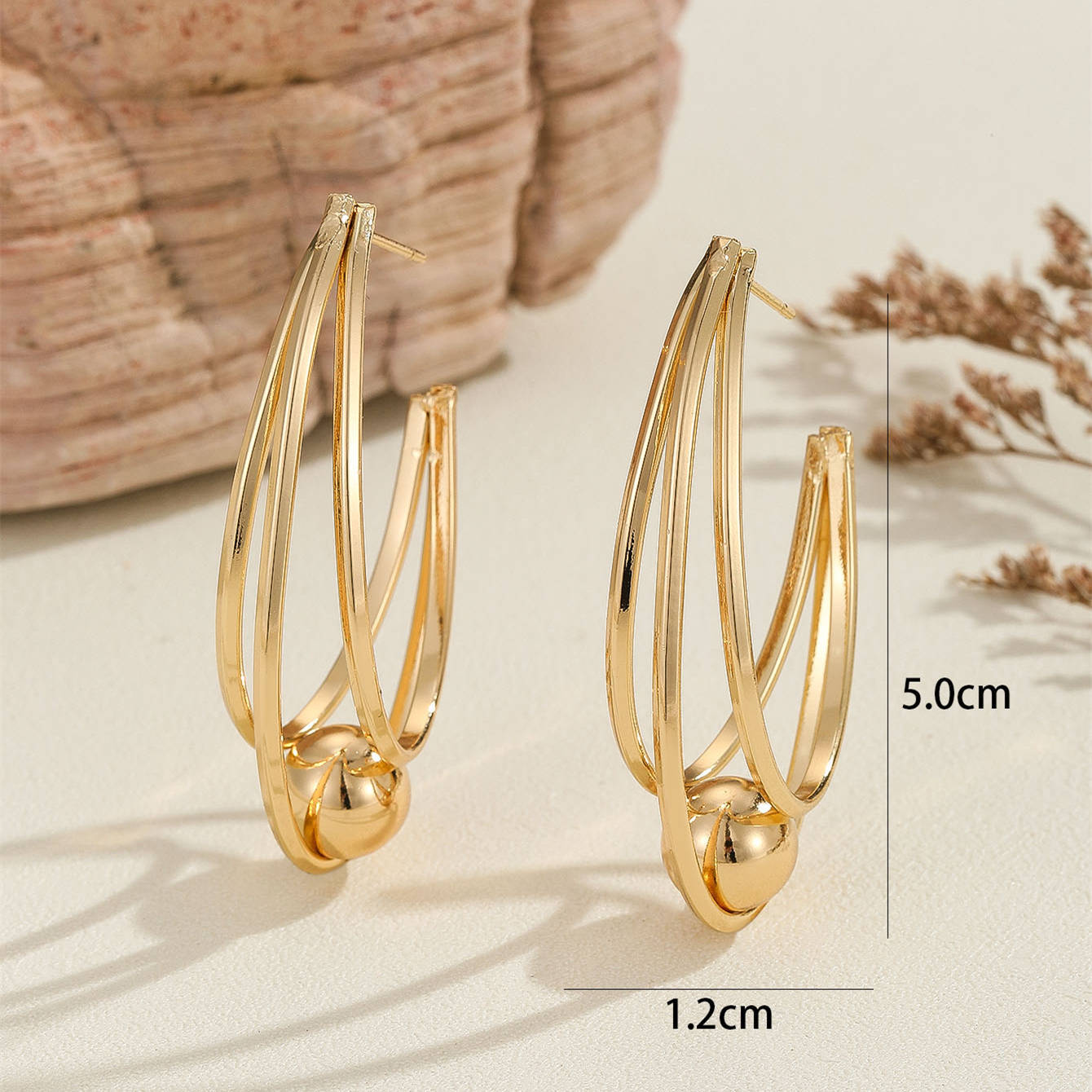Damen Ohrringe mit eleganten, geschwungenen Linien Shop Nory