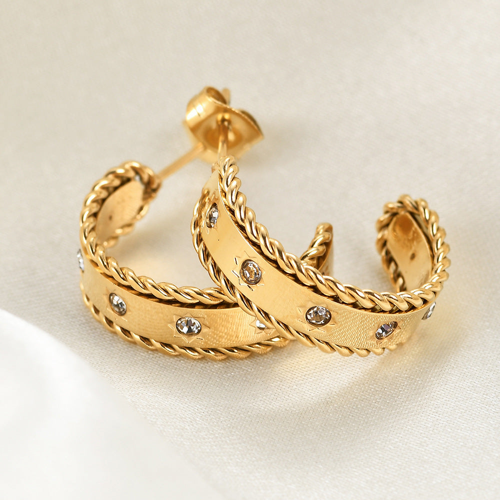 Damen Creolen mit funkelnden Kristallen und elegantem Spiraldesign Shop Nory