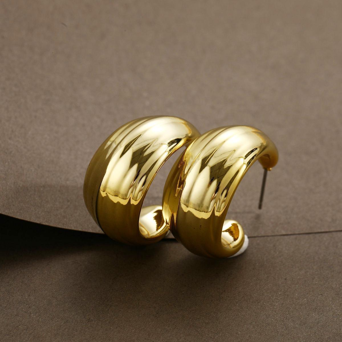 Damen Statement-Ohrringe mit elegantem, geschwungenem Design Shop Nory