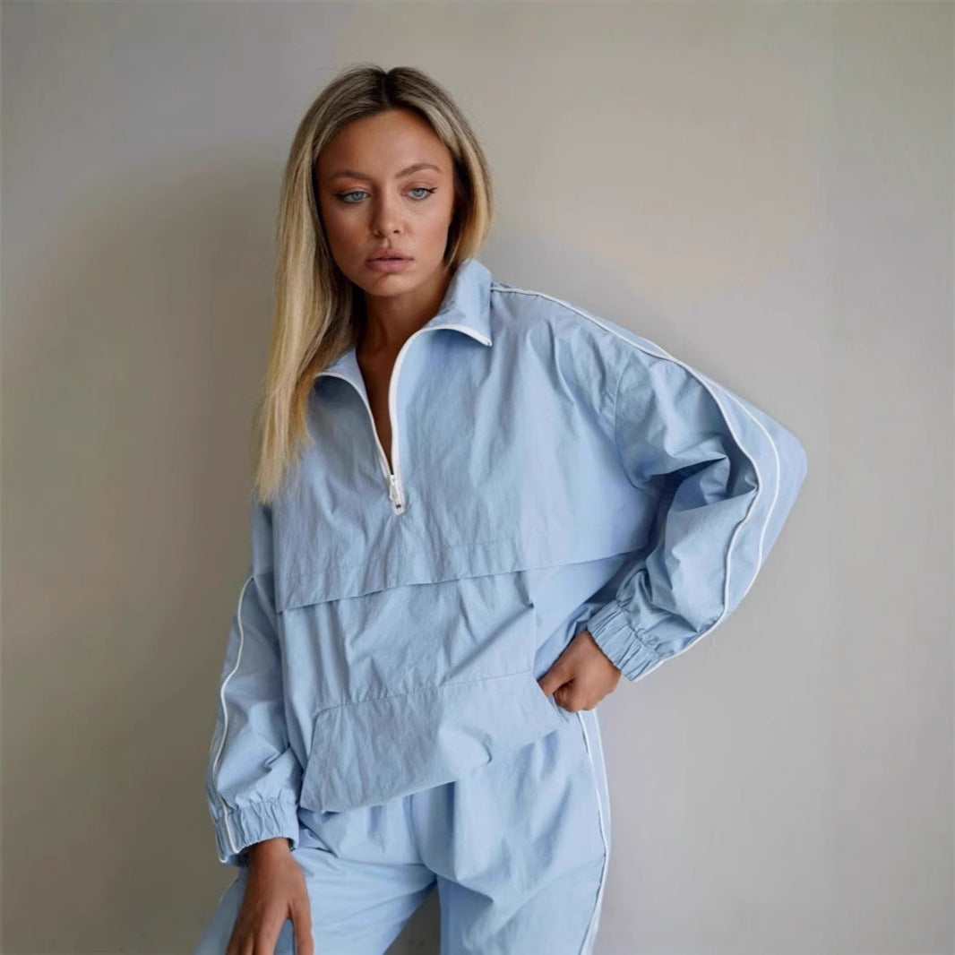Damen leichtes Half-Zip Windbreaker-Oberteil mit Kängurutasche, elastischen Bündchen und seitlicher Paspel Shop Nory