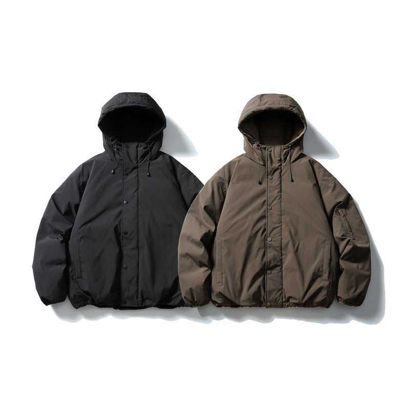 Unisex Boxy wattierte Kapuzenjacke mit Tunnelzug, Druckknopfleiste und Ärmeltasche Shop Nory