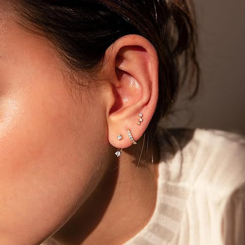 Damen Ohrstecker im eleganten Design mit funkelnden Zirkonia Shop Nory