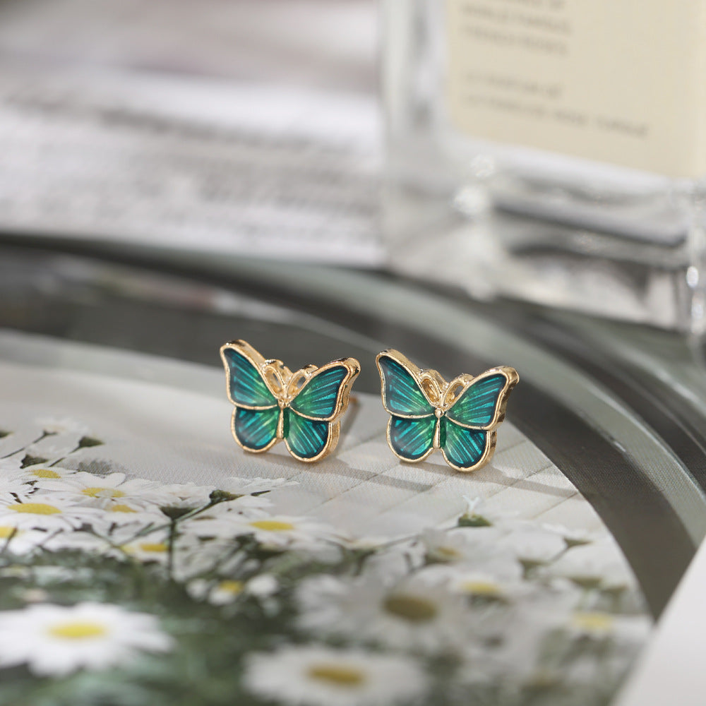 Damen Ohrringe mit floralem Schmetterlingsdesign Shop Nory