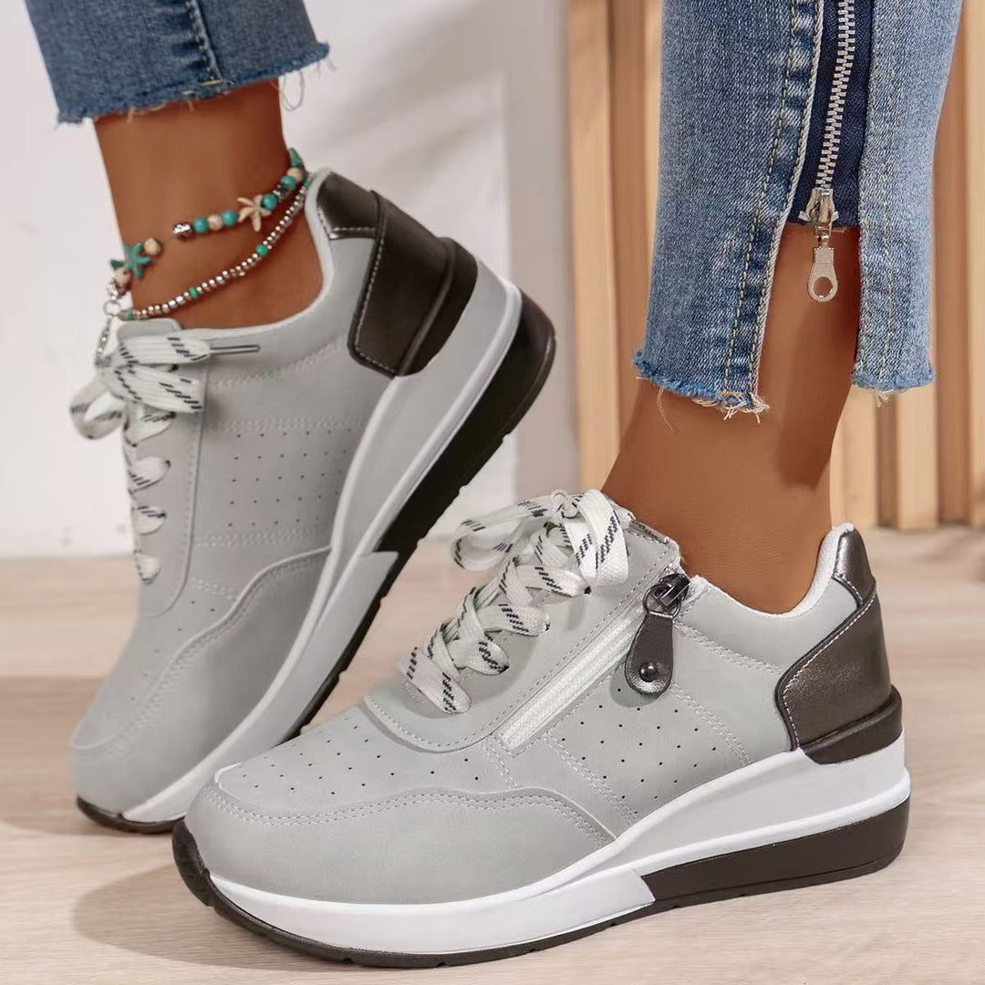 Damen sportive Plateau-Wedgesneaker mit seitlichem Zipper, perforiertem Nubuklook und dämpfender EVA-Sohle Shop Nory
