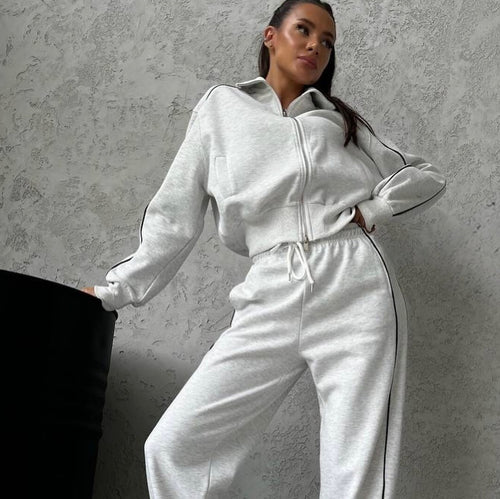 Damen lässiges Sweatset mit Stehkragen Reißverschluss gekürzter Jacke und hochtaillierter Schlaghose Shop Nory