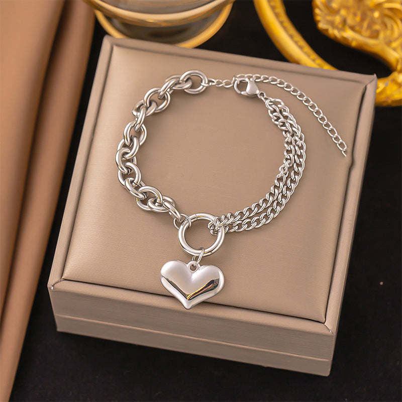 Damen Armband mit Herz-Anhänger und elegantem Kettendesign Shop Nory