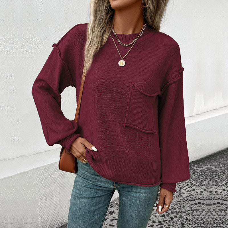 Damen Oversize Rundhals-Strickpullover mit aufgesetzter Brusttasche und fransiger Saumnaht Shop Nory