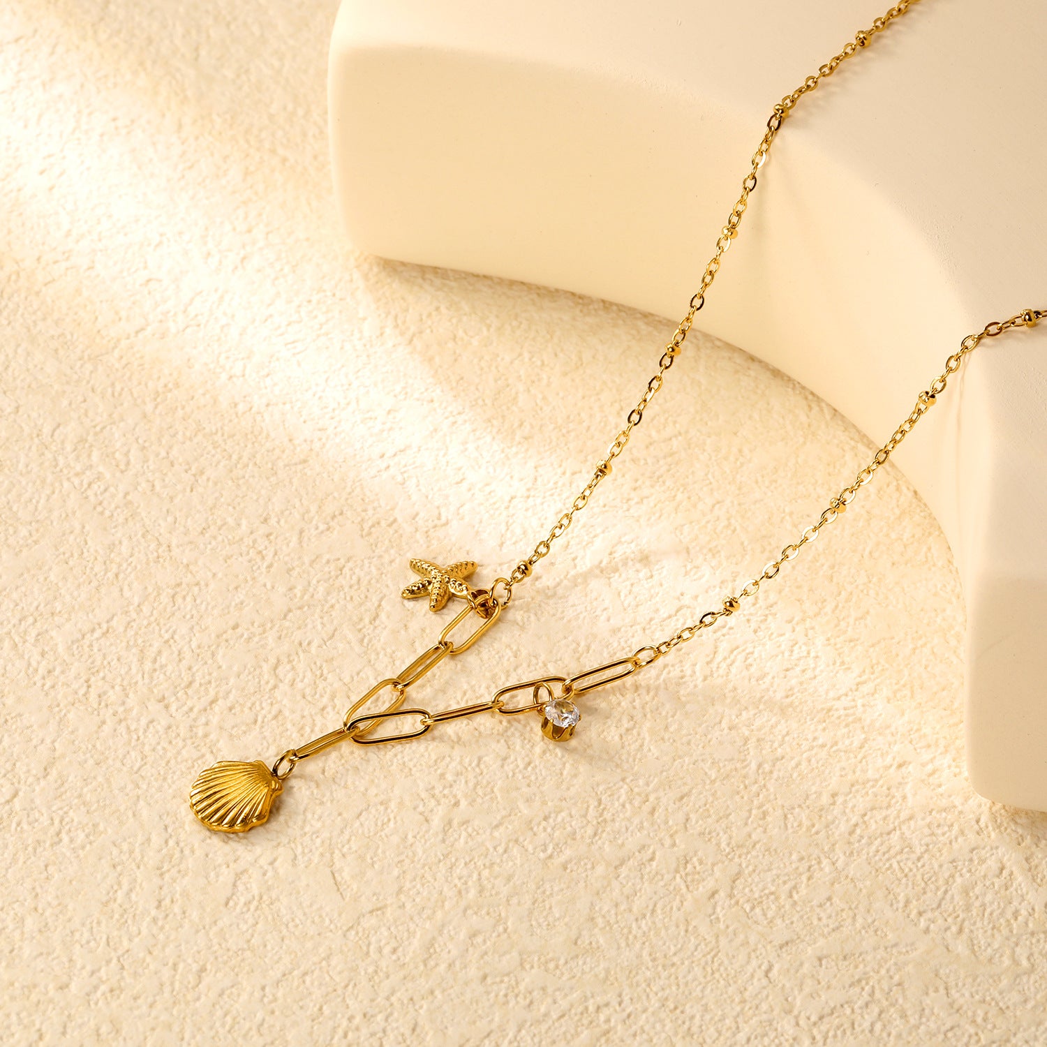 Damen Halskette mit maritimem Muschel- und Sternenanhänger Shop Nory