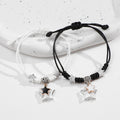 Damenarmband mit funkelnden Sternanhängern Shop Nory