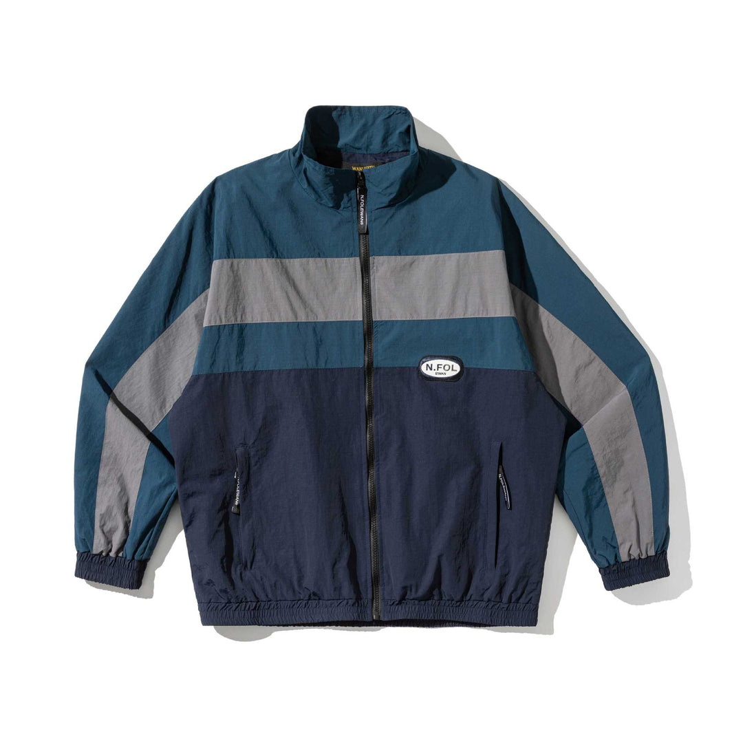 Unisex Leichte Colorblock Windbreaker‑Jacke mit Stehkragen und Elastikbündchen Shop Nory