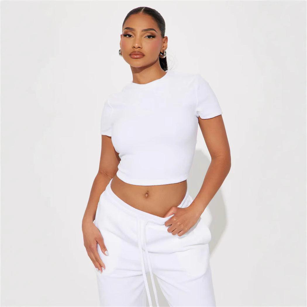 Damen Velours-Hausanzug mit bauchfreiem Shirt und weit geschnittener taillenhoher Jogginghose Shop Nory