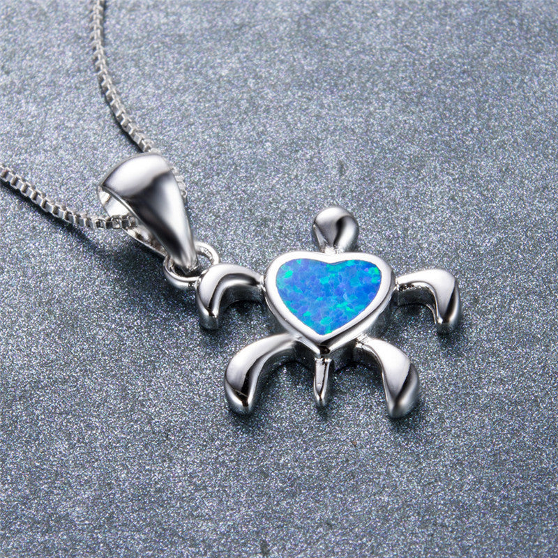 Damen Schmuckanhänger in Schildkrötenform mit herzförmigem Opal-Shop Nory