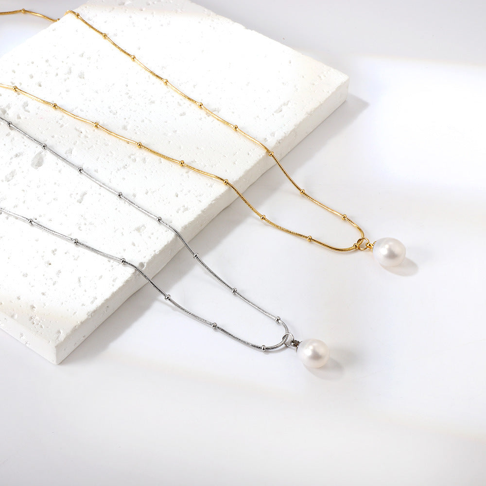 Damen Halskette mit hochwertigem Perlenanhänger aus vergoldetem Edelstahl Shop Nory