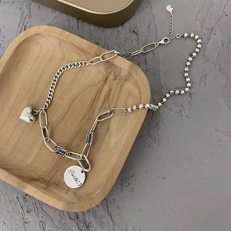 Damen Charmante Armbanduhr mit Herz- und Smile-Anhänger Shop Nory