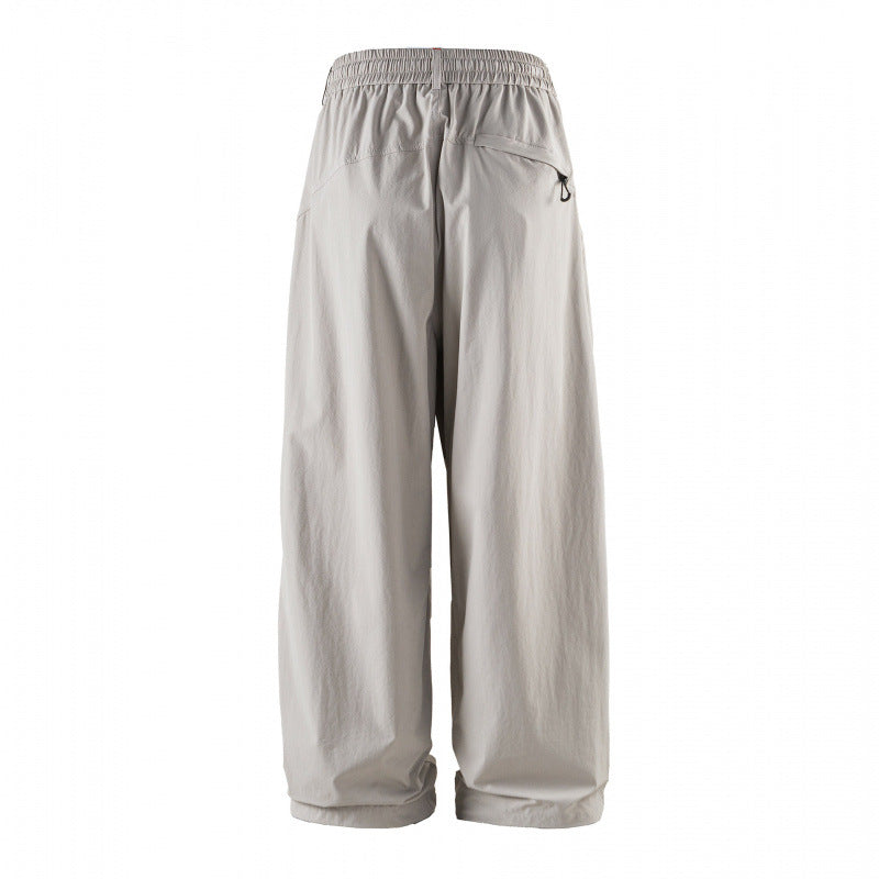Unisex Weitgeschnittene technische Cargo-Hose mit Gummibund, Kordelzug und Reißverschlusstaschen Shop Nory